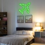 Green airplane neon sign